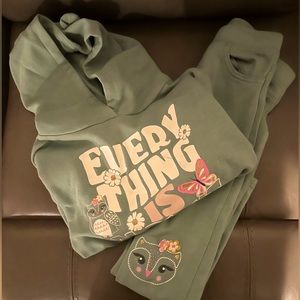 Two piece matching jogging suit